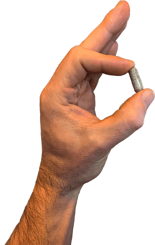 hand holding nugenix pill